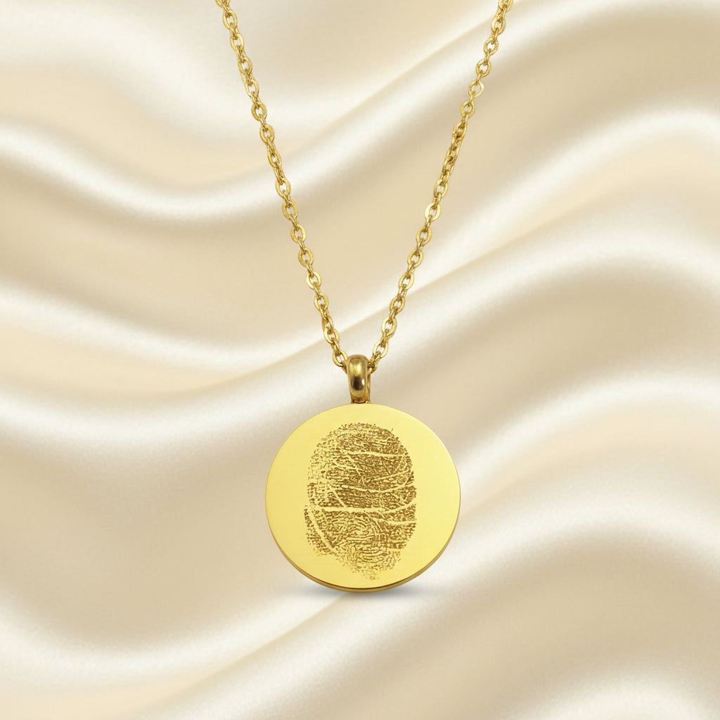 Gold necklace with fingerprint